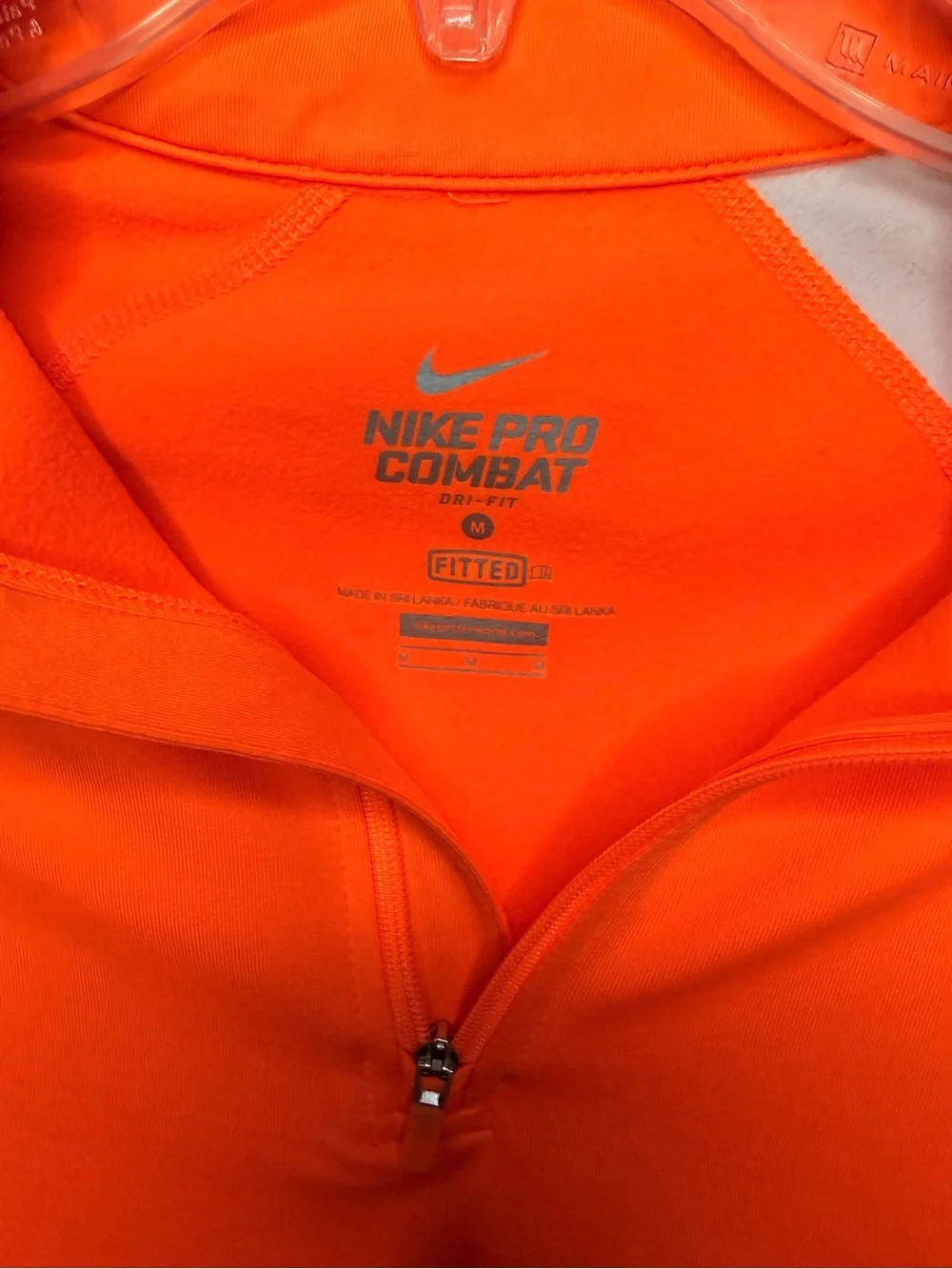 Nike Women’s Long-Sleeve Quarter-Zip Performance pullover- Neon Orange
